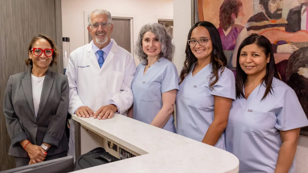 Dr. Sinkin and his team at their Manhattan dental office